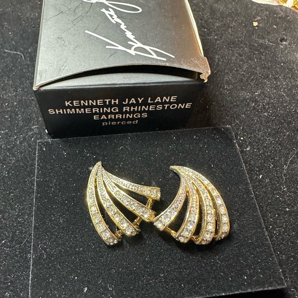 A pair of vintage Kenneth Jay Lane gold tone swirl rhinestones earrings